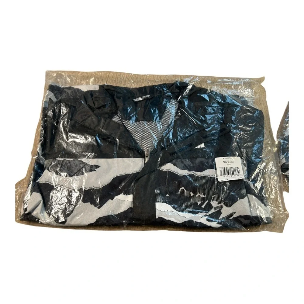 The north face Boys’ Antora Rain Jacket in TNF Black Mountain Traverse P…